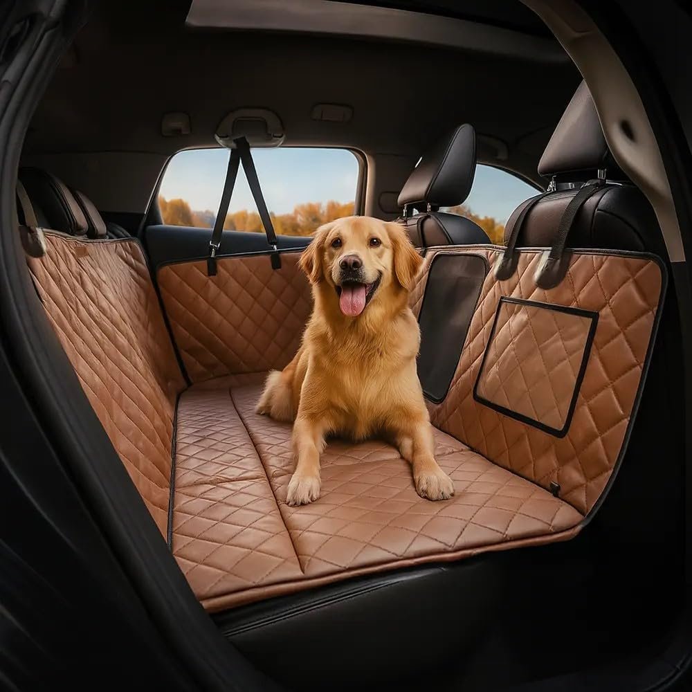 FUNNY FUZZY tan quilted back seat extender with mesh window installed in a car with a golden retriever