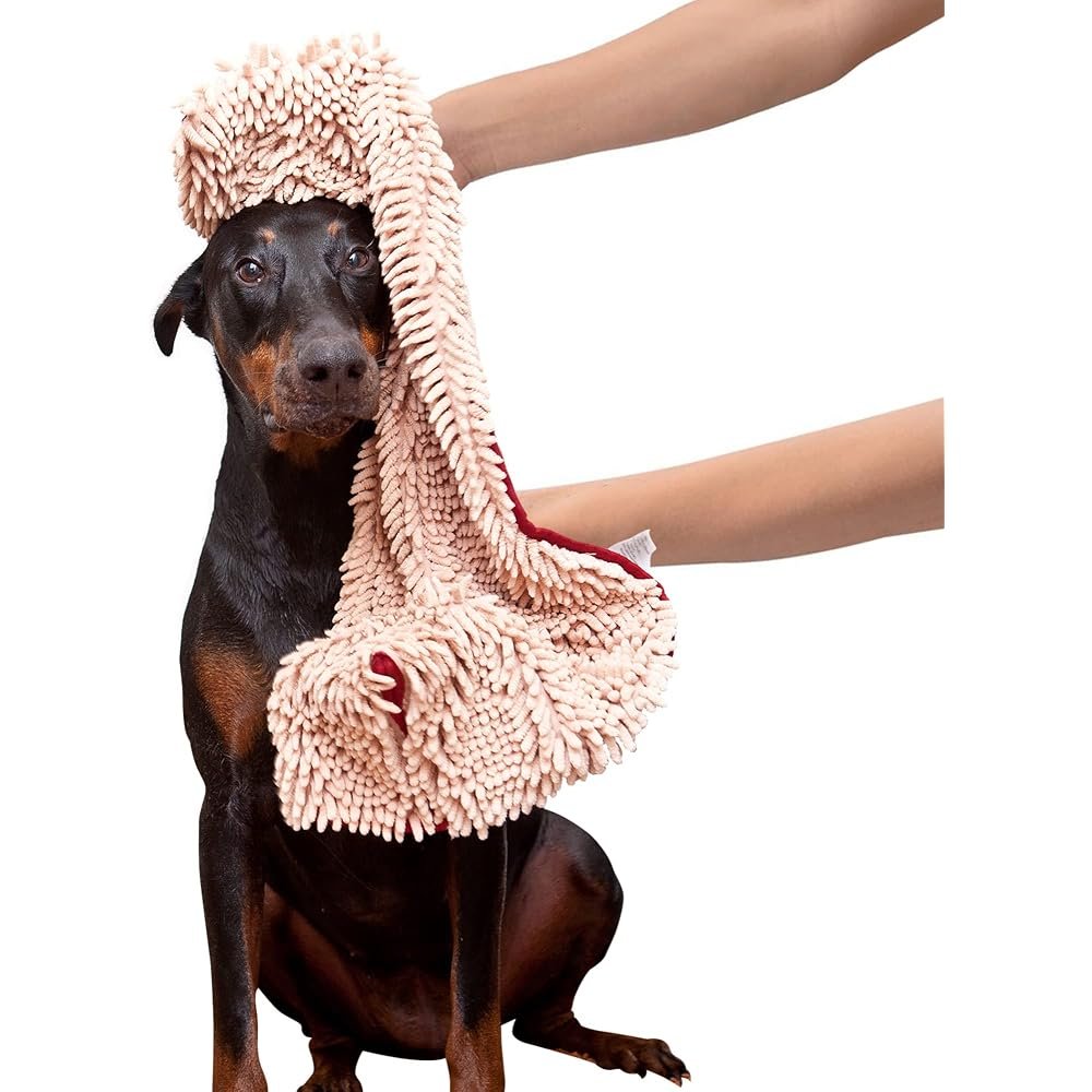 Soggy Doggy Super Shammy, beige noodle chenille with red trim, draped over a dog